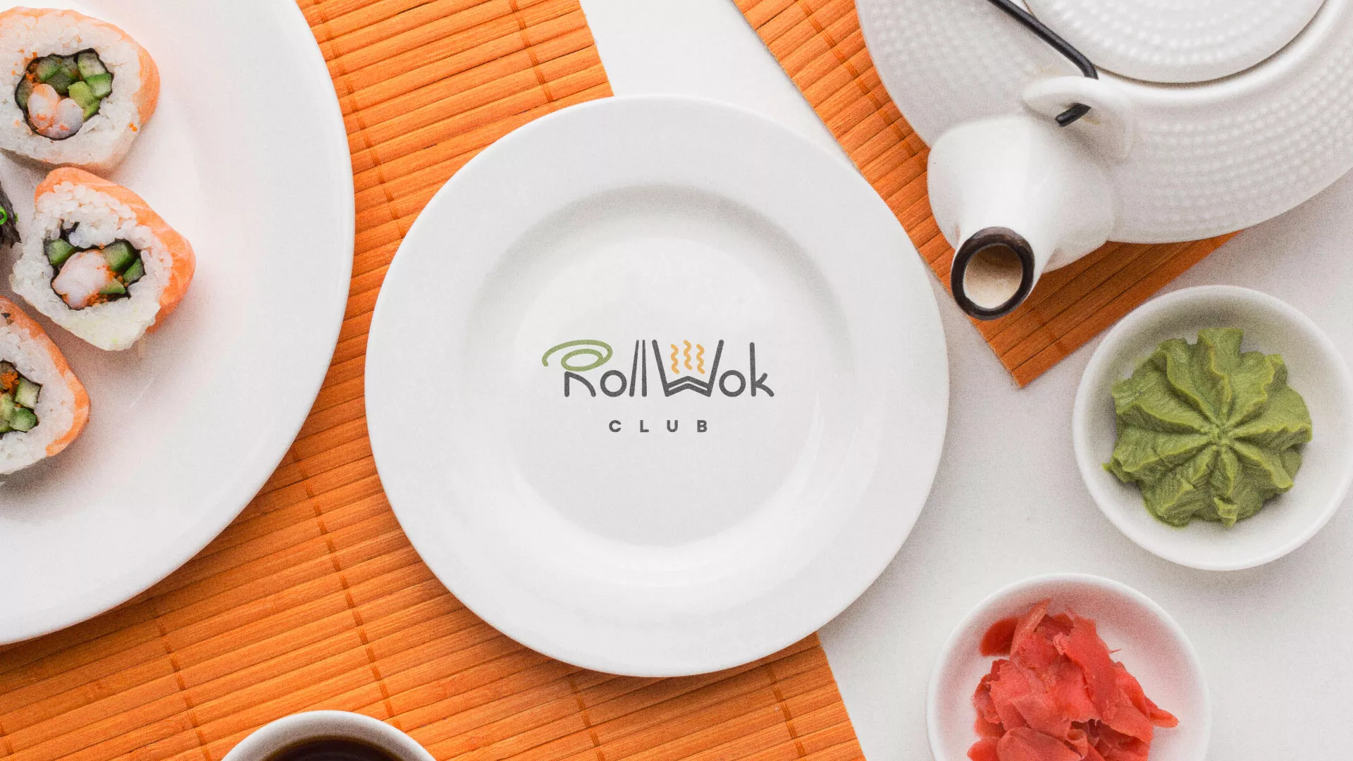 Разработка логотипа и фирменного стиля в Нововоронеже для суши-бара «Roll Wok Club» Разработка логотипа и фирменного стиля в Нововоронеже для суши-бара «Roll Wok Club»